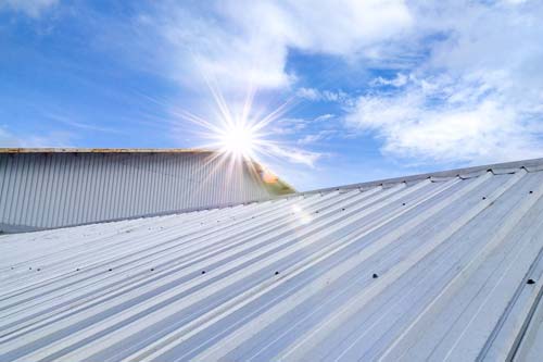 Closeup of a metal commercial roof in the sun.
